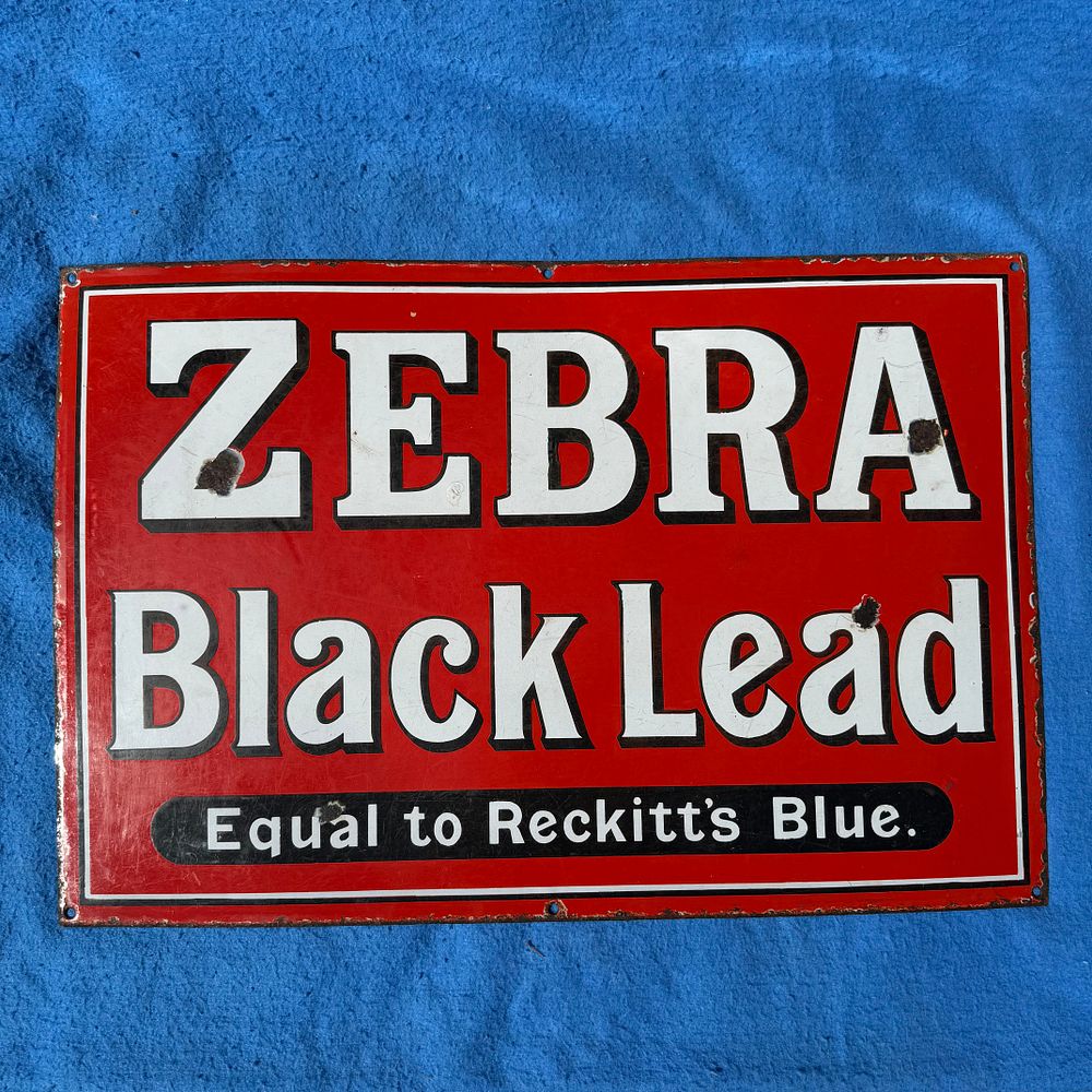 Lot 304: Zebra Black Lead Enamel Advertising Sign