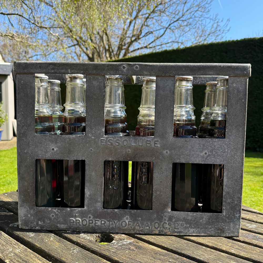 Lot 153: Essolube Metal Oil Bottle Carrier with Twelve Glass Bottles