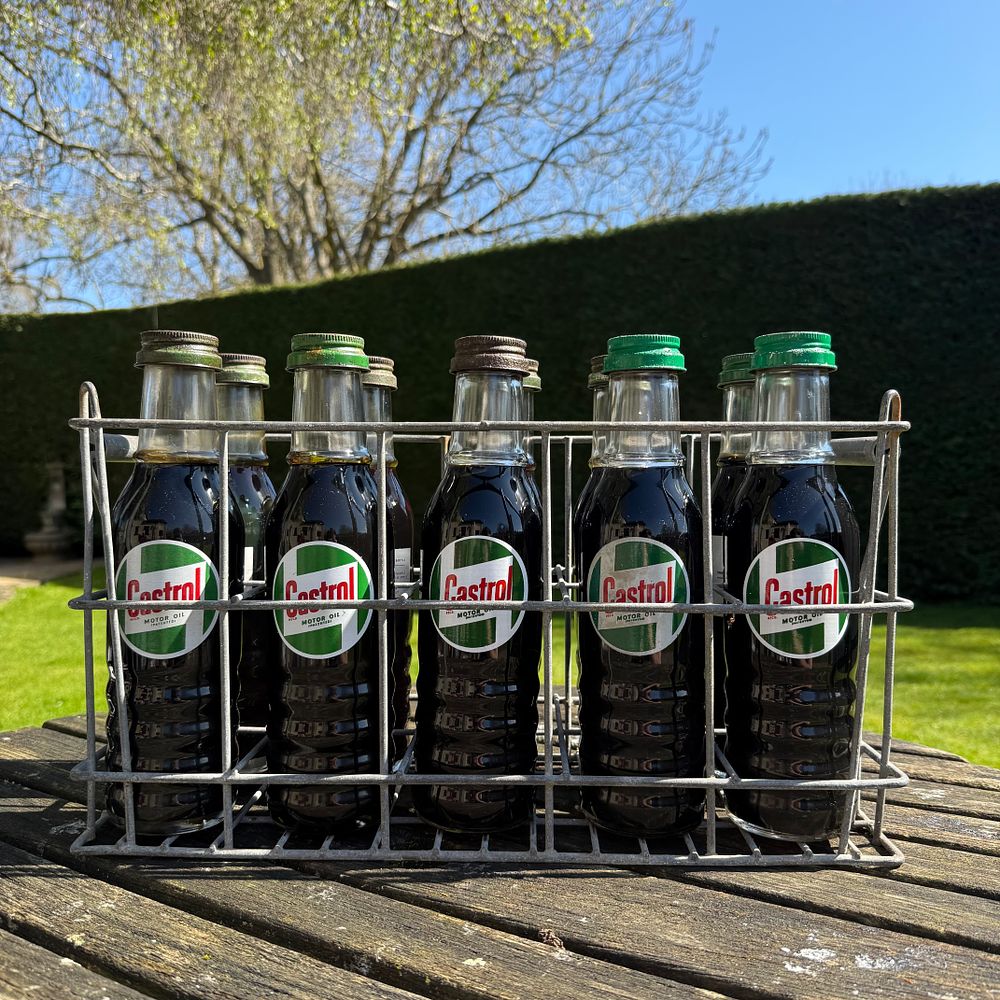 Lot 154: Castrol Motor Oil Bottles and Wire Carrier