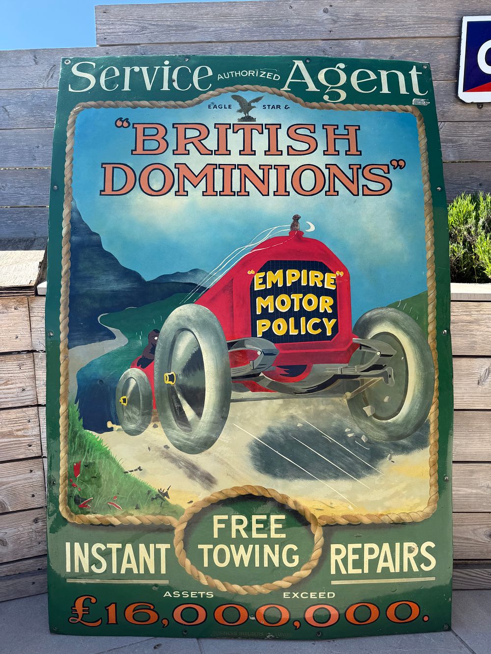 Lot 105: British Dominions Empire Motor Policy Enamel Advertising Sign