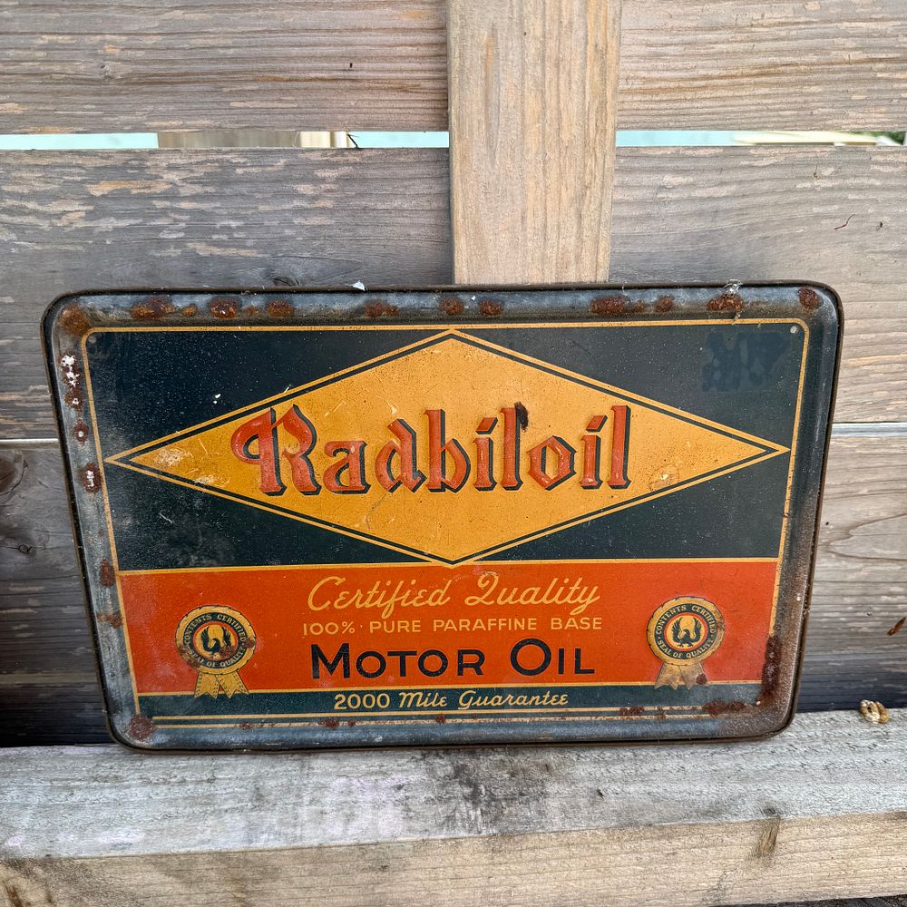 Lot 458: Radbiloil Motor Oil Lithographed Tin Advertising Sign