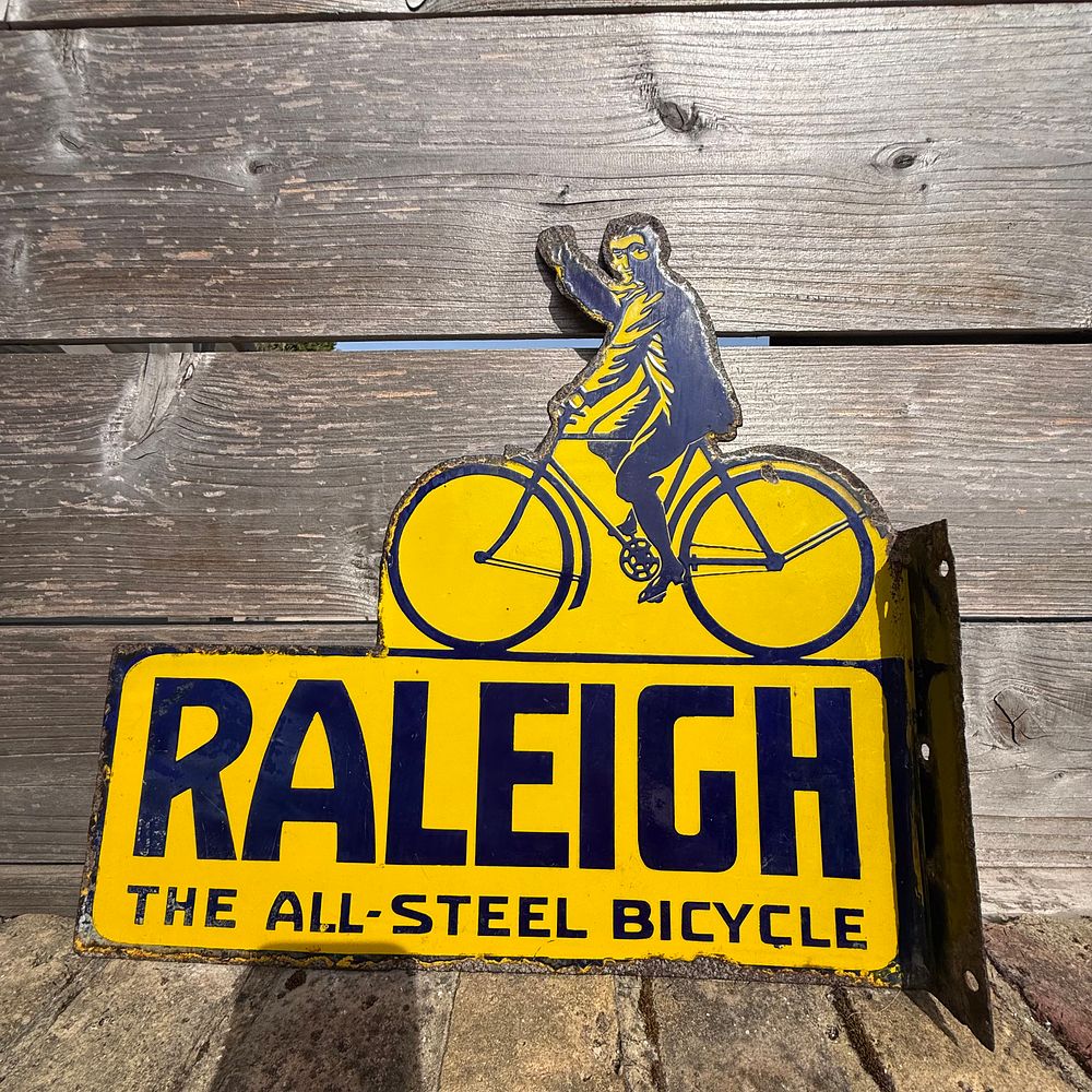 Lot 531: Raleigh The All-Steel Bicycle Flanged Enamel Advertising Sign