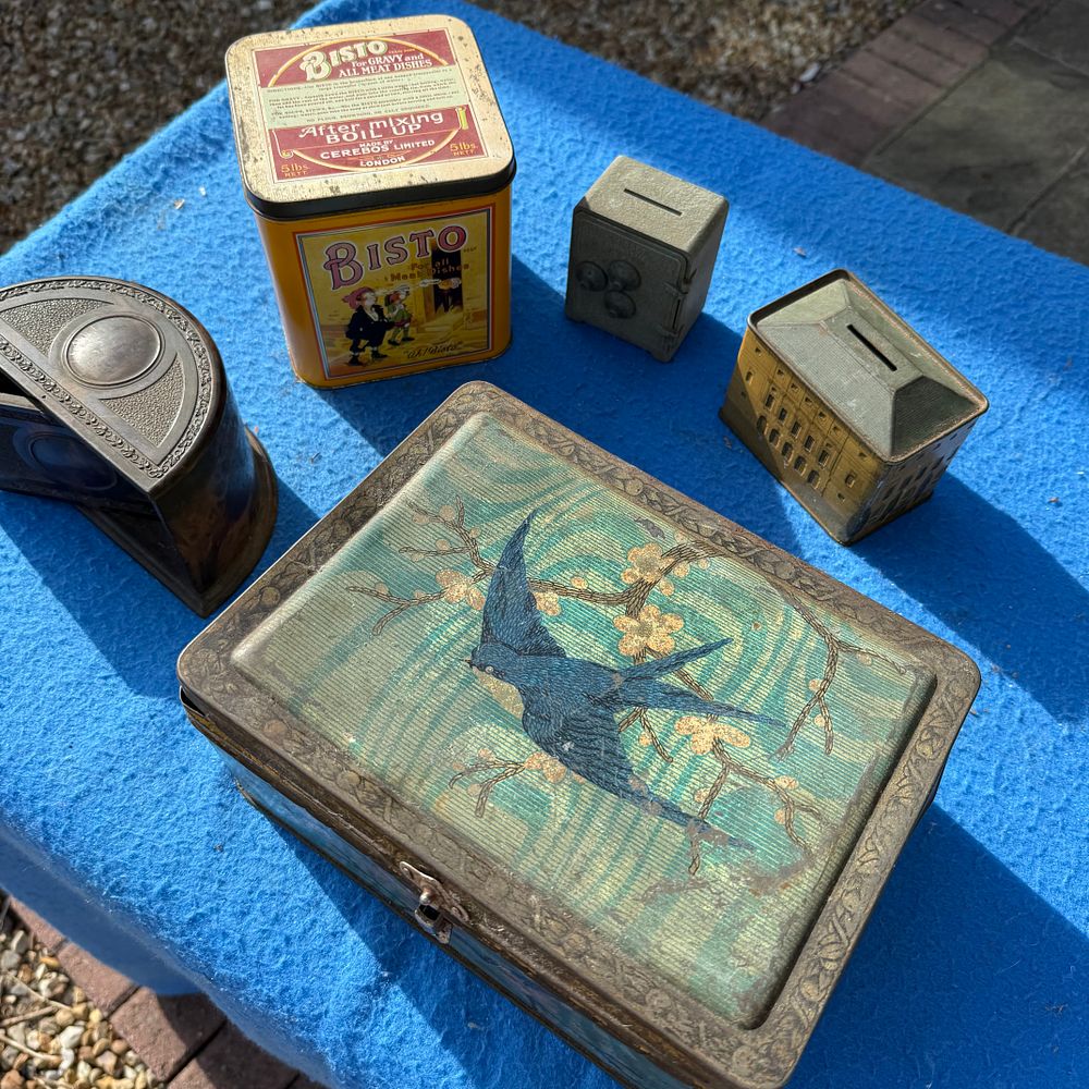 Lot 523: An Assortment of Advertising Tins, Novelty Banks and a Stationery Organiser