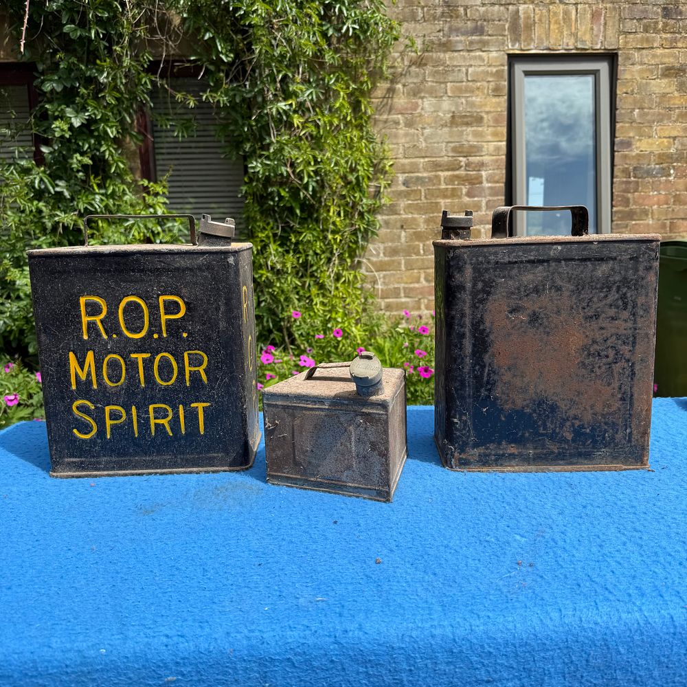 Lot 564: A Trio of R.O.P., Redline and Stadium Petrol and Oil Cans