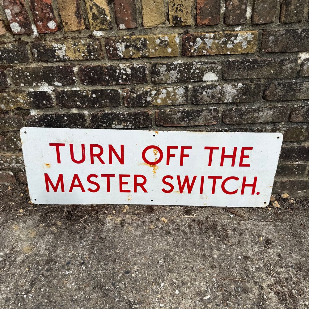 Lot 596: Turn Off The Master Switch Enamel Advertising Sign