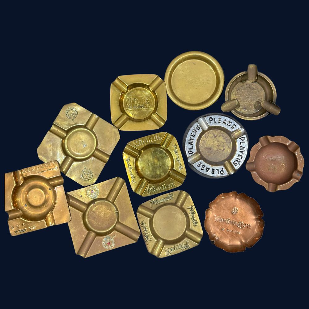 Lot 185: A Collection of Brass and Copper Advertising Ashtrays and Dishes