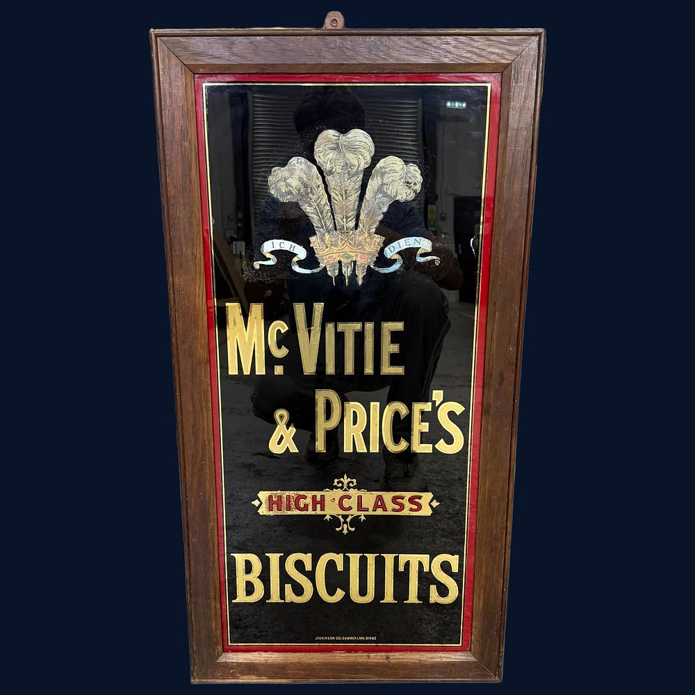 Lot 249: McVitie & Price's Biscuits Reverse Painted Glasss Advertising Sign