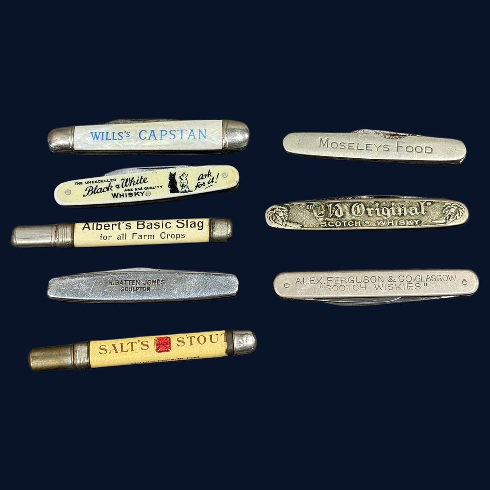 Lot 299: A Collection of Eight Advertising Pen Knives