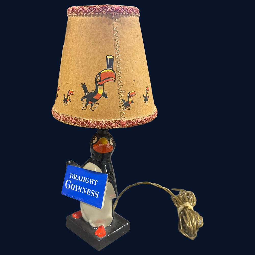 Lot 311: Draught Guinness Advertising Ceramic Penguin Lamp