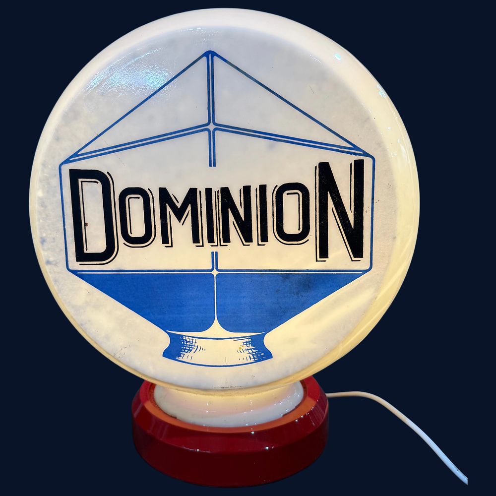 Lot 440: Dominion Petrol Pump Globe