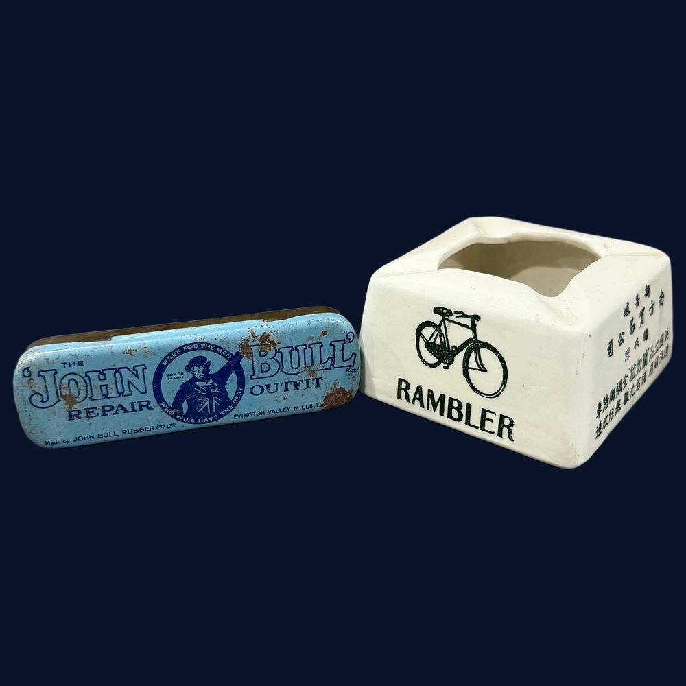 Lot 525: Two Cycling Advertising Items, John Bull Repair Outfit Tin and Rambler Cycle Ceramic Ashtray