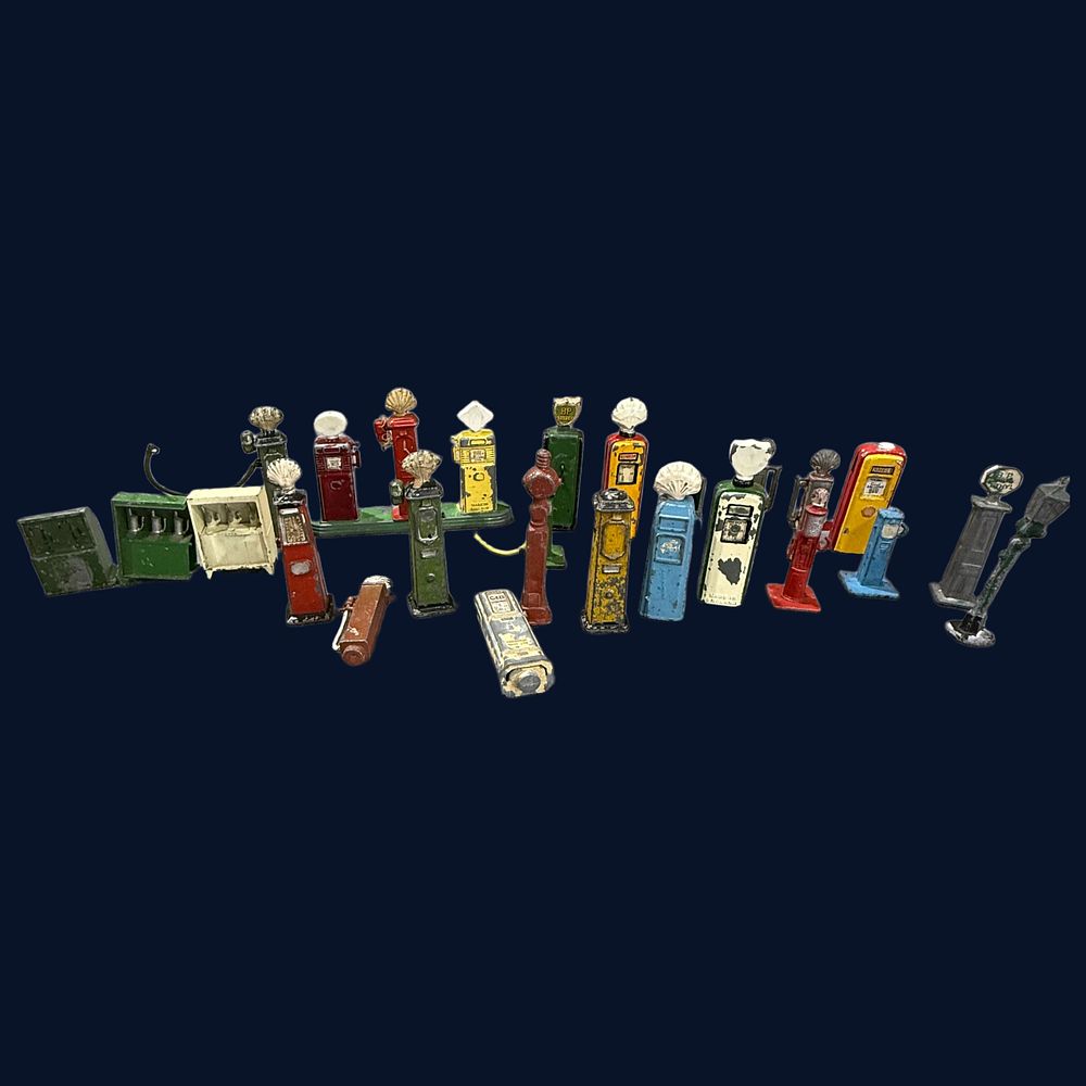 Lot 532: A Collection of Minature Petrol Pumps and Service Station Accessories