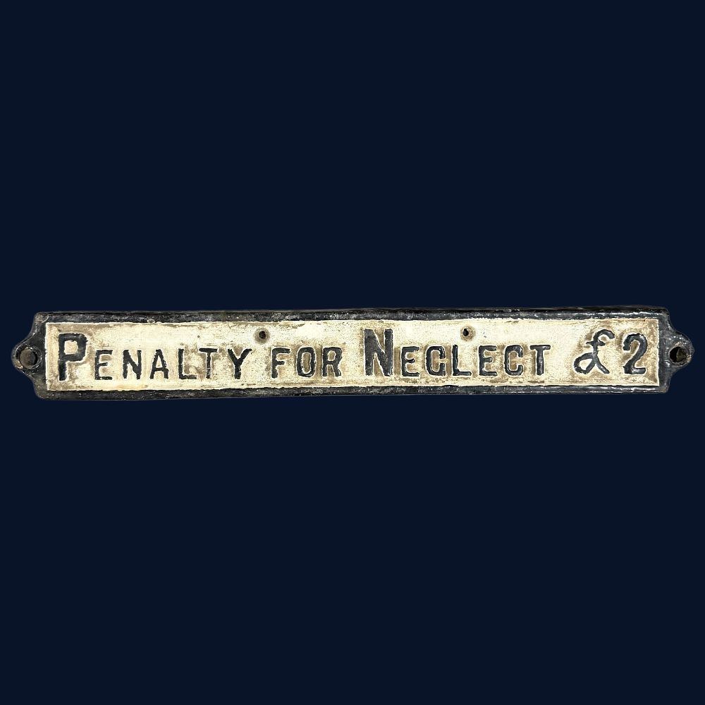 Lot 601: Penalty For Neglect £ 2 Cast Iron Sign