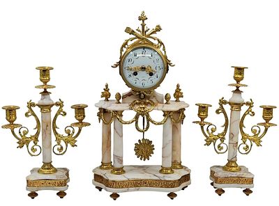 An antique and impressive French Garniture set from the 19th century. Which includes a mantel 
