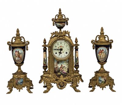 Garniture set, 19th century, including mantel clock and two matching jugs, made of bronze and 