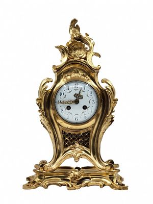 Antique French mantel clock made of gold-plated bronze (Ormolu), the mechanism is signed by the 