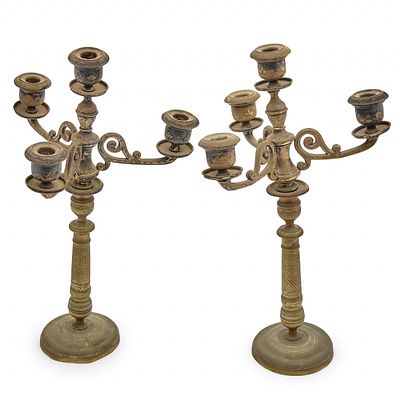 Pair of antique French candlesticks from the Napoleonic era (Empire style) made of brass. Conditi 