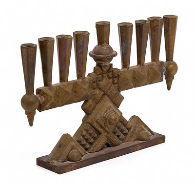 Massive and especially heavy bronze Menorah. Rare model 
Width: 28 cm 
Height: 20 cm