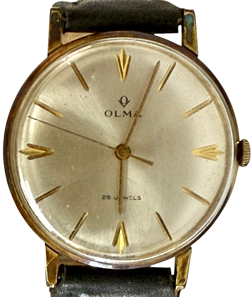 OLMA שעון מכני תוצרת שווייץ . קוטר 33 מ״מ 
חגורת עור מילר 
מצב עובד