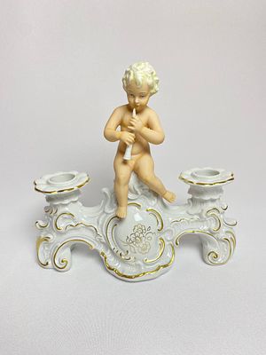 Фарфоровый подсвечник на две свечи с Путти. Производство Германия мануфактура SCHAUBACH KUNST. 
