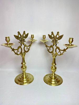 Пара тяжёлых больших бронзовых подсвечников на две свечи с навершием в виде орла. Производство 