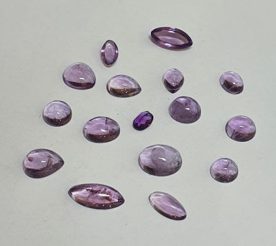לוט 16 אבני אמטיסט מלוטשות, 43 קראט ,נהדרות לשיבוץ , טבעיות מכספת אחריות מלאה