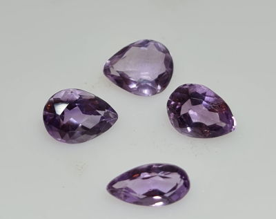 לוט 4 אבני אמטיסט מלוטשות, 12 קראט, סופר AAA, ליטוש גרמני משנות ה-80, טבעיות מהכספת 