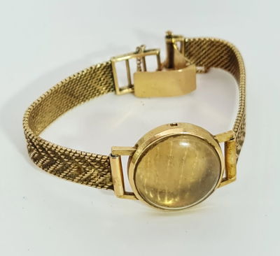 צמיד ובית שעון מזהב 14 קראט חתום ,החה פעם שעון , המנגנון הוצא ממנו , משקל 21.55 גרם 