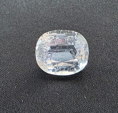 אבן קונזייט מלוטשת סופר AAAּ+++, משקל 15.24 קראט, הוצאה מבריפקה עם תג מחיר של 15$ 