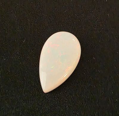 אבן אופל מלוטשת, משקל 14.5 קראט, יפהפיה, נוצצת וזוהרת, טבעית מהכספת באחריות מלאה 