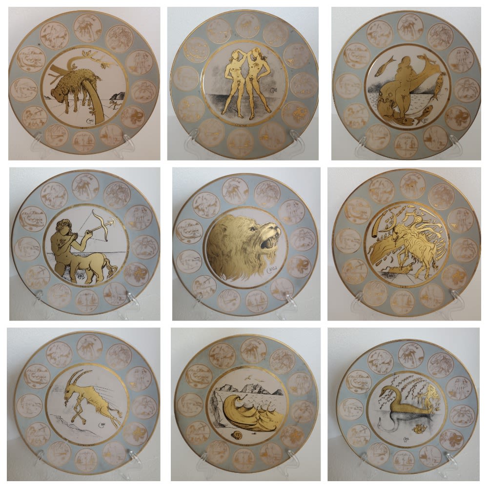 По эскизам Сальвадора Дали уникальный фарфоровый сервиз из 12 тарелок с изображением астральных 
