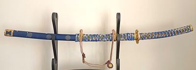 Самурайский меч КАТАНА. Декоративный.
Материалы ножен – сталь, ткань. 
Длина лезвия 68 см
Длина 