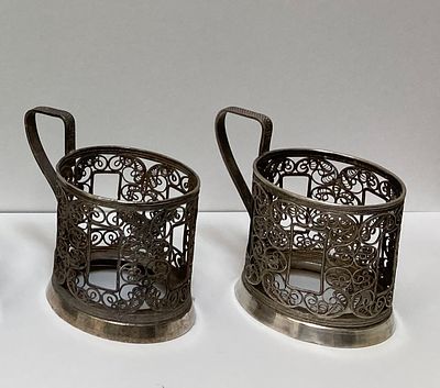 Пара изящных подстаканников &laquo;Вьюны 3&raquo;.
Тончайшие нити мельхиора искусно переплетались мастером 