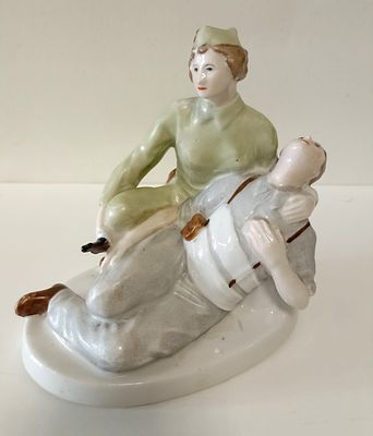 Статуэтка &laquo;Испанская дружинница с раненым бойцом&raquo;
Автор модели Марчук Р. (1930г.)
Городницкий 