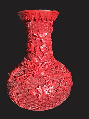 Сложная китайская ваза в технике лаковой многоступенчатой резьбы Цинабар.
Высота 19 см. 