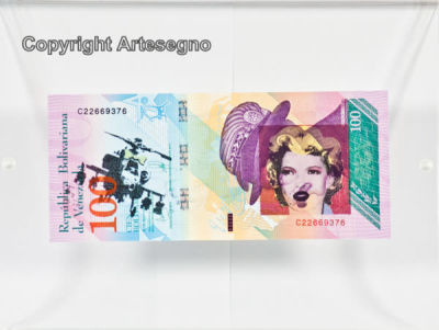 Banksy (1974) - 100 Bolivares banknote with spray and mixed media in plexiglass case 
cm 6,5x15,5 