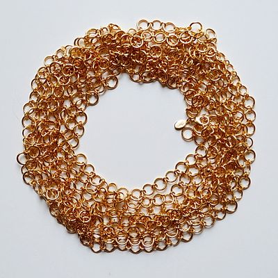 JOAN RIVERS Необыкновенное винтажное колье в виде трехслойной очень длинной цепочки Маркировка: 