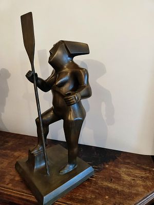 "Девушка с веслом" высота 51 см. бронза. Ф .Крущельницкий.