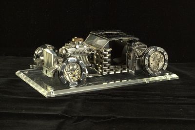 Левон Аракелян "Rolls-Royce". Детали часовых механизмов. 
Высота 6.5/11/17 см. Оформлена под 