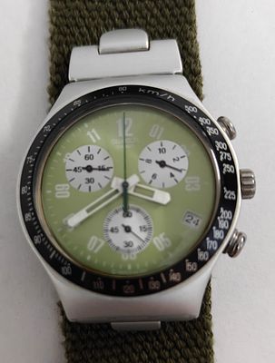 שעון יד "סוואטצ'" SWATCH מסידרת IRONY. כרונוגראף יפיפה. עם תאריך בשעה ארבע. צבע הלוח ירוק, הצבע 