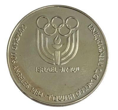 מדליית אולימפיאדת לוס אנג'לס שנת 1984 עשויה כסף 935. קוטר 37 מ"מ, משקל 26 גרם
