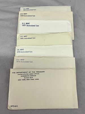 7 1970's Uncirculated U.S. Coin Currency Sets. 7 US Mint uncirculated coin sets, 1972, 74, 75