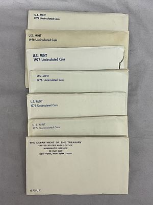 7 1970's Uncirculated U.S. Coin Currency Sets. 7 US Mint uncirculated coin sets, 1972, 74, 75