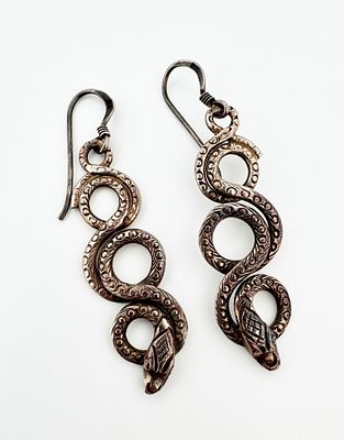 Silver Snake Earrings. Silver snake earrings 
6.69g 
41mm long