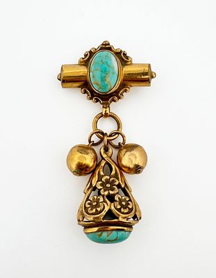 10k Turquoise Brooch. 10k gold and turquoise brooch 
19.6g 
75mm long