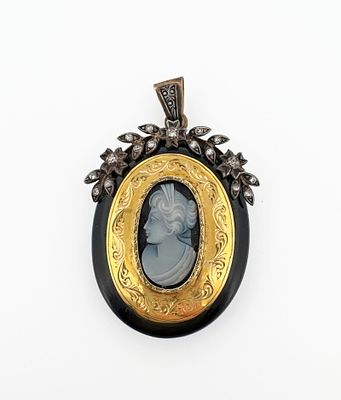 14k Onyx & Diamond Cameo Pendant. 14k and silver 
28.2g 
63x37mm