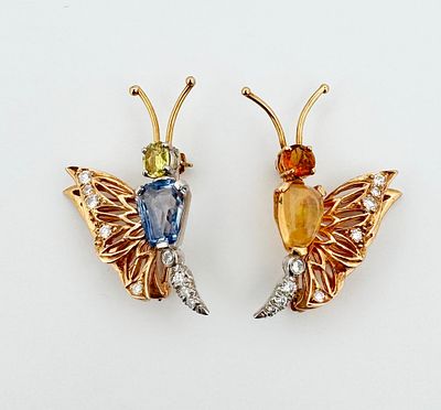 Two 14k Gold Butterfly Pins. Two 14k yellow gold and gemstone butterfly pins 
11.3g 
32mm long