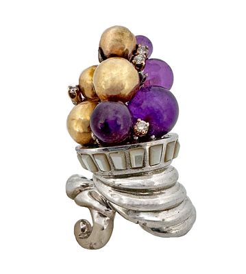 Erte 14k Sterling Amethyst Ring. Erte sterling silver and 14k gold ring in the form of a 