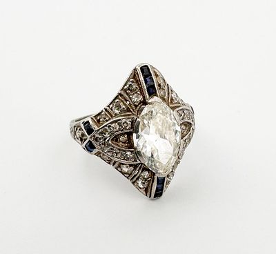 Platinum Marquise Diamond Ring, Antique. Platinum diamond and sapphire ring 
4.8g 
Antique 