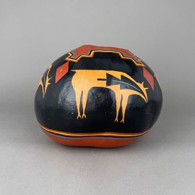 Painted Gourd by Kathy MacKnight. Painted gourd by Kathy MacKnight, 1994 
9" x 13" 
8.8 oz